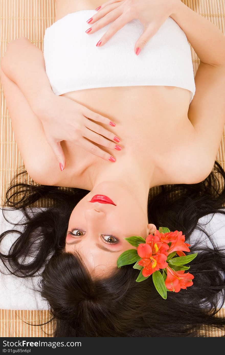 Spa brunette with flowers