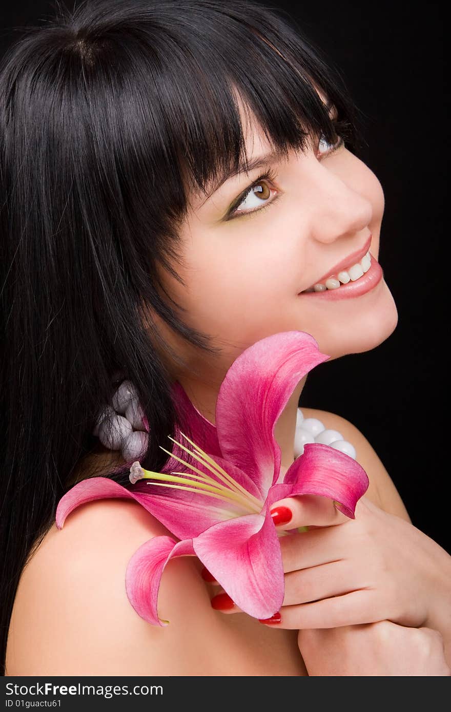 Young woman with lily flower. Young woman with lily flower