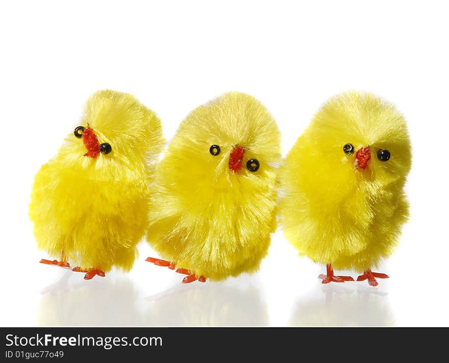 Three Easter chicks isolated on white