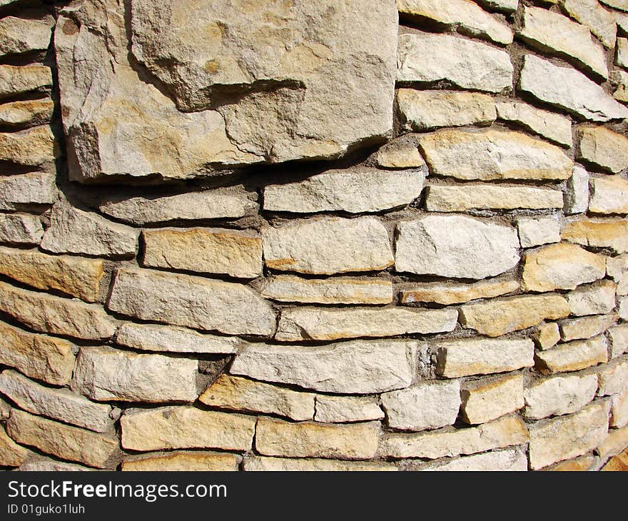 Irregular brick wall with various tint and forms of brick. Irregular brick wall with various tint and forms of brick