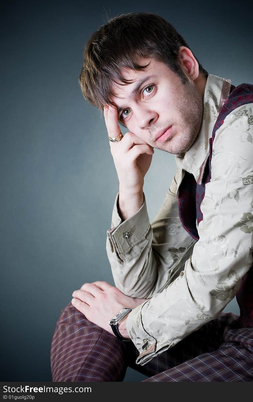 Thoughtful stylish man, studio shot