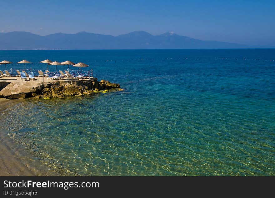 Sunshades in Turkish resort in the Aegean sea