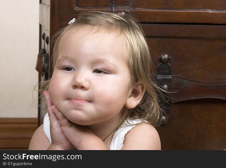 Little girl with short hair and beautiful facial expressions