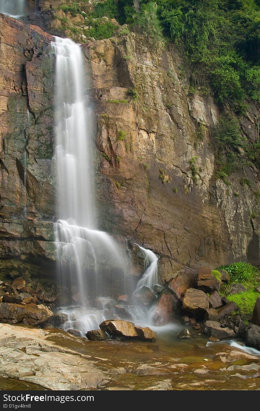 Waterfall in rainforest in Srilanka. Waterfall in rainforest in Srilanka.