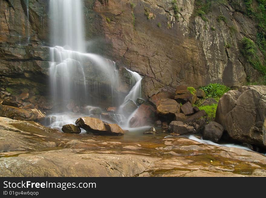 Waterfall in rainforest in Srilanka. Waterfall in rainforest in Srilanka.