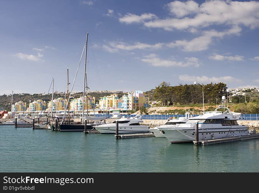 Fun, Sun and Wind - Yachts in Albufeira marine, south of Portugal (no logos and brands). Fun, Sun and Wind - Yachts in Albufeira marine, south of Portugal (no logos and brands)