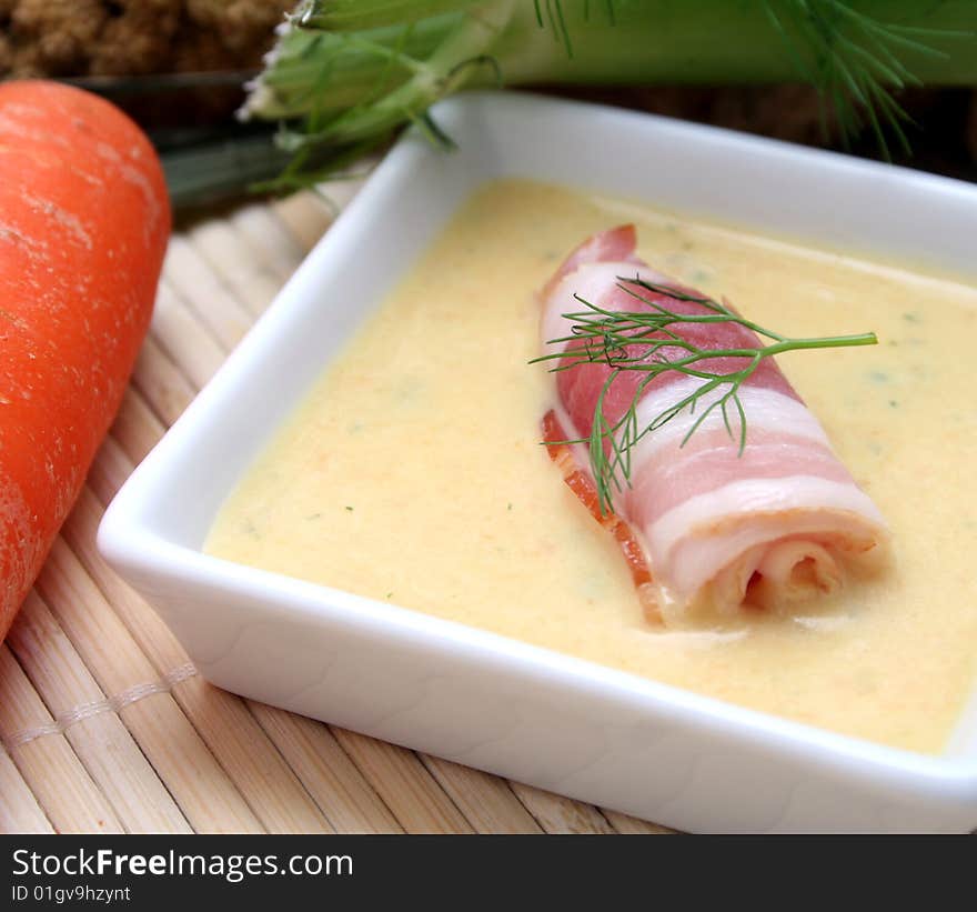 A fresh soup of fennel with some bacon