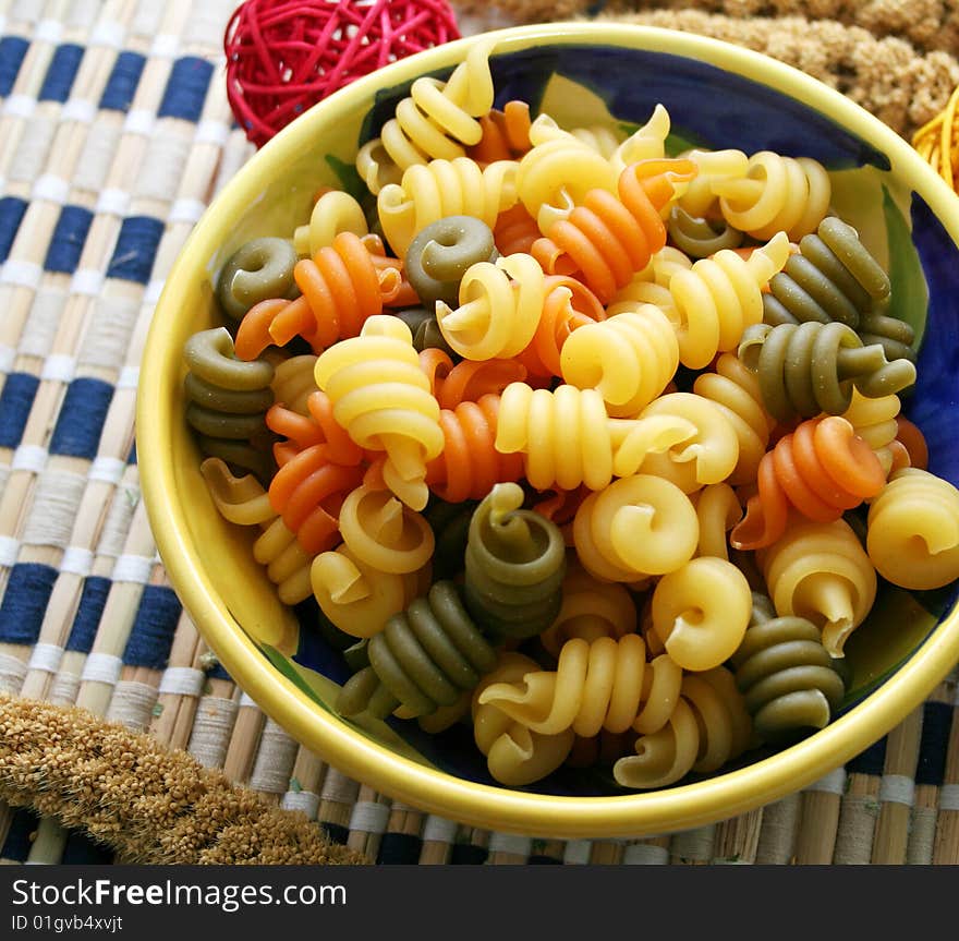 Italian pasta tricolor an a beautiful bowl