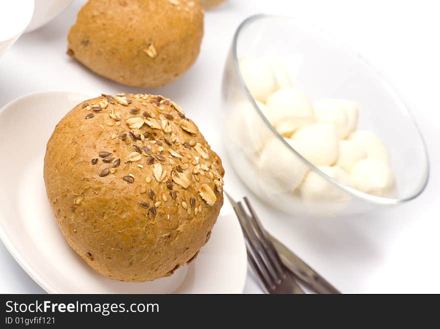 Bread and mozzarella closeup on white