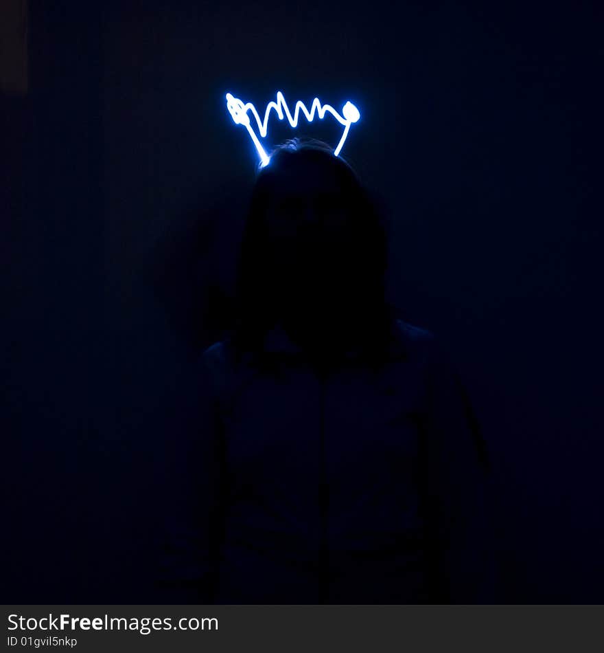 Wavy laser light. Women silhouette.