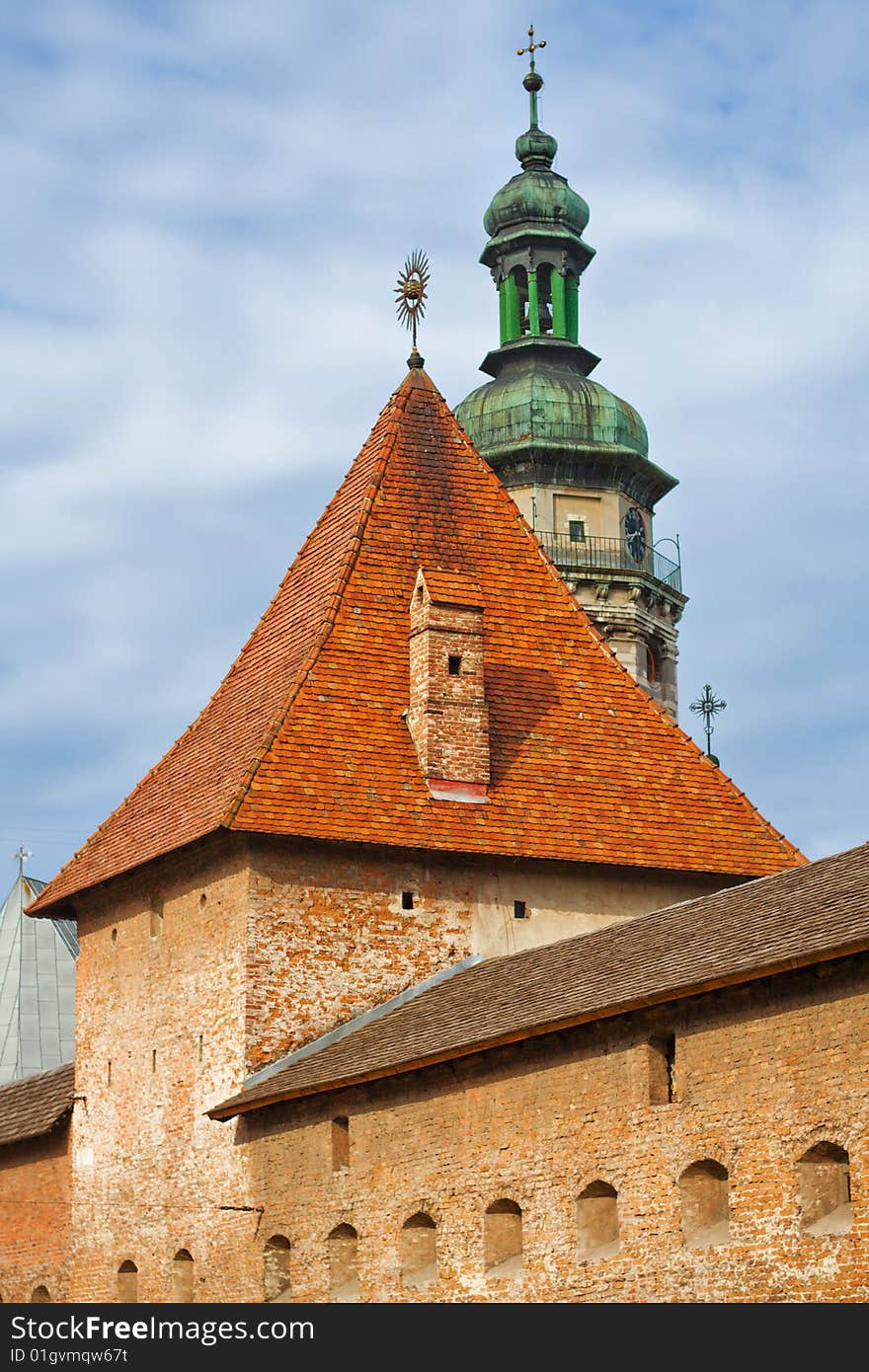 Old fortress tower against blue sky