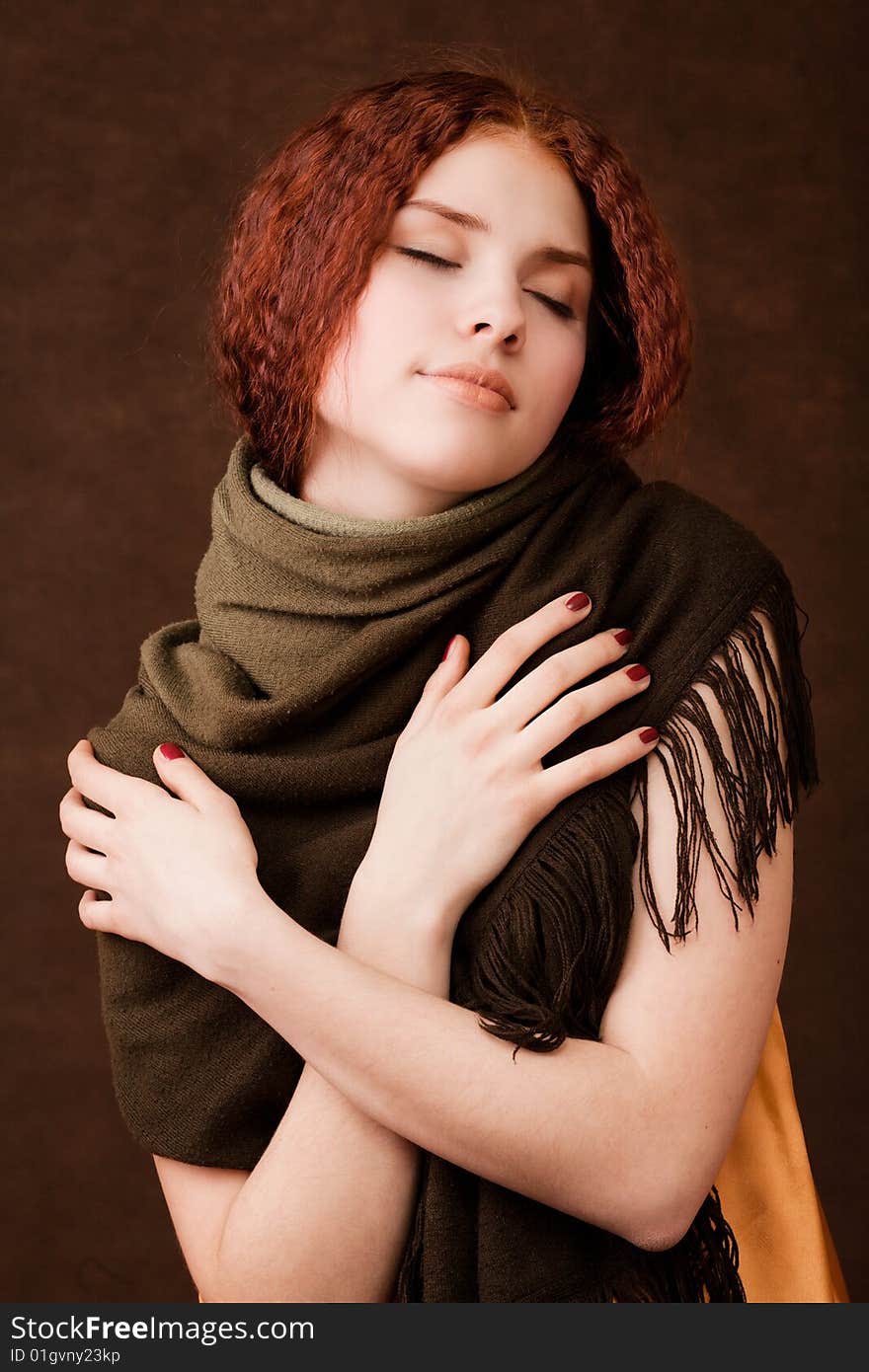 Young pretty girl with green scarf