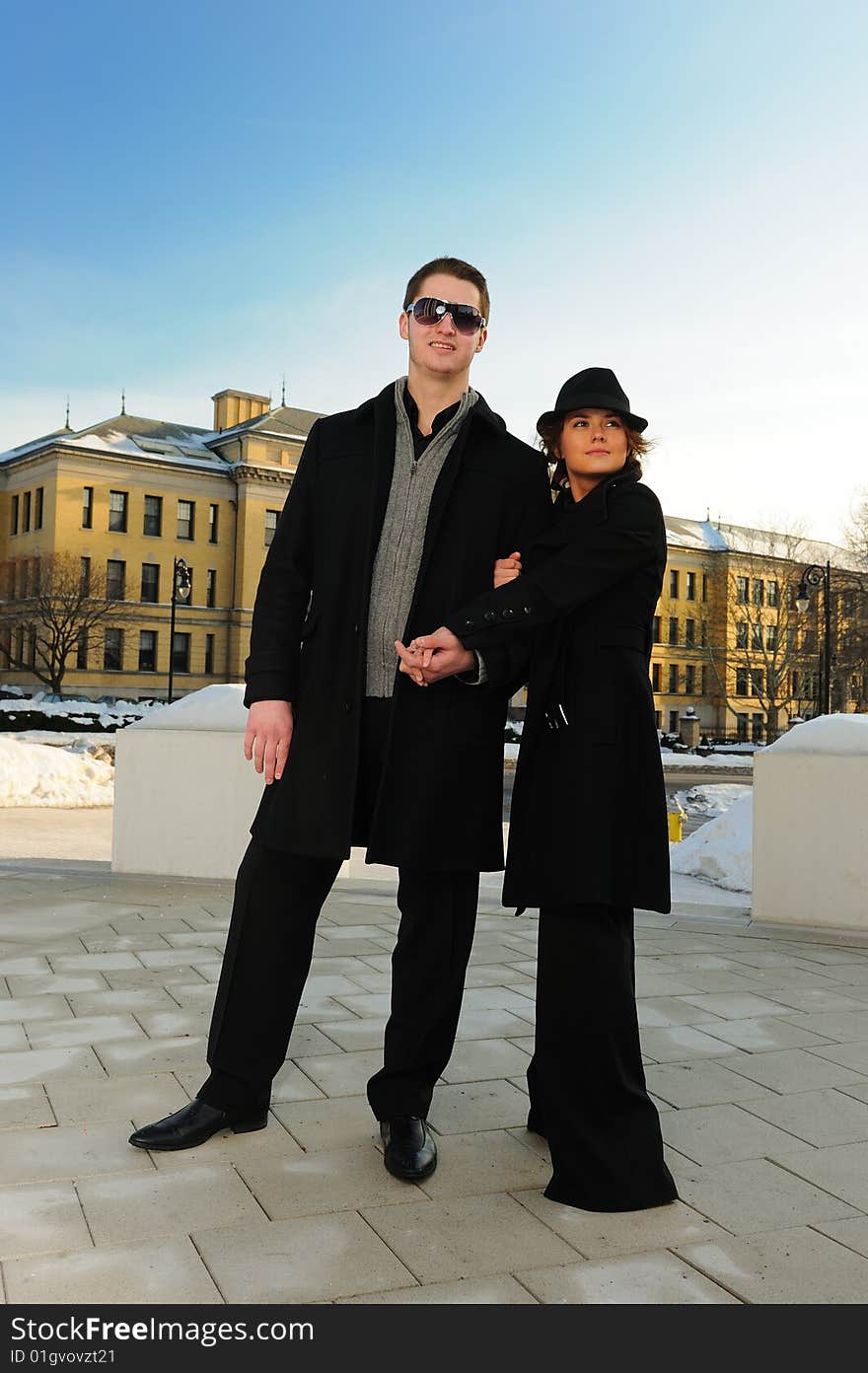 Young couple going to a walk in the town