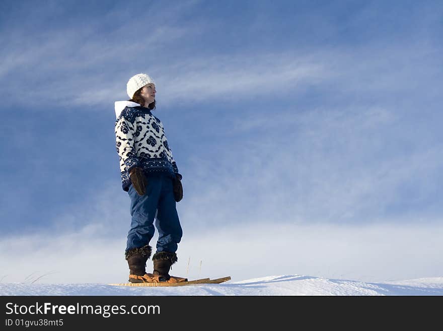 Woman stands on slope