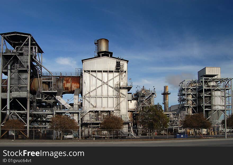 Burners at an oil refinery sit idle over the weekend. Burners at an oil refinery sit idle over the weekend.