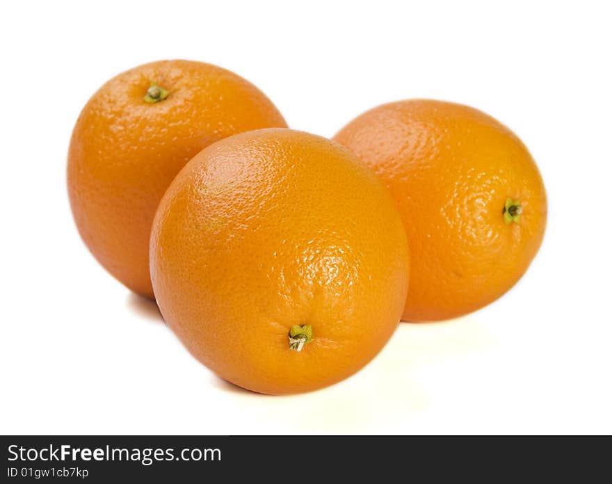 Three fresh oranges