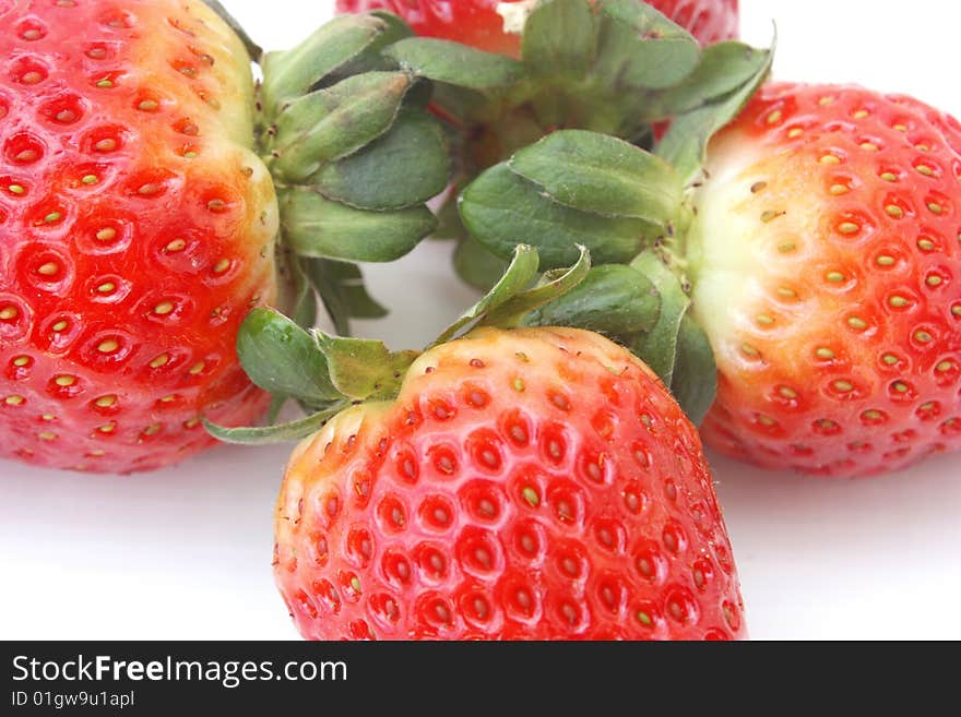 Close up of four ripe strawberries. Close up of four ripe strawberries