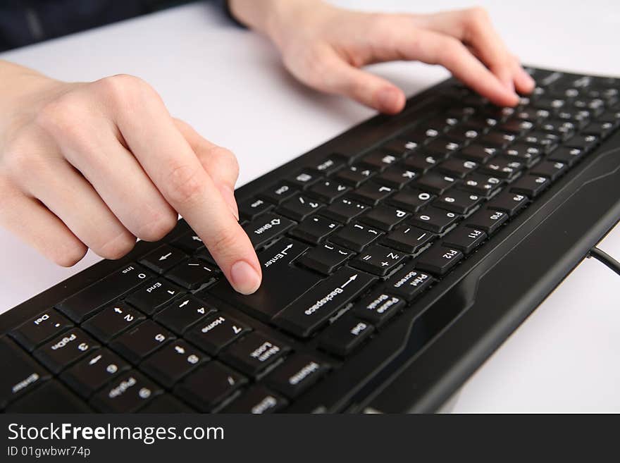 Woman is typing on keyboard. Woman is typing on keyboard.