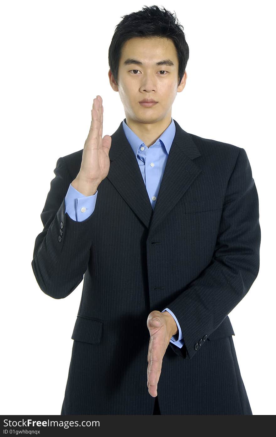 Asian young businessman posing on white. Asian young businessman posing on white