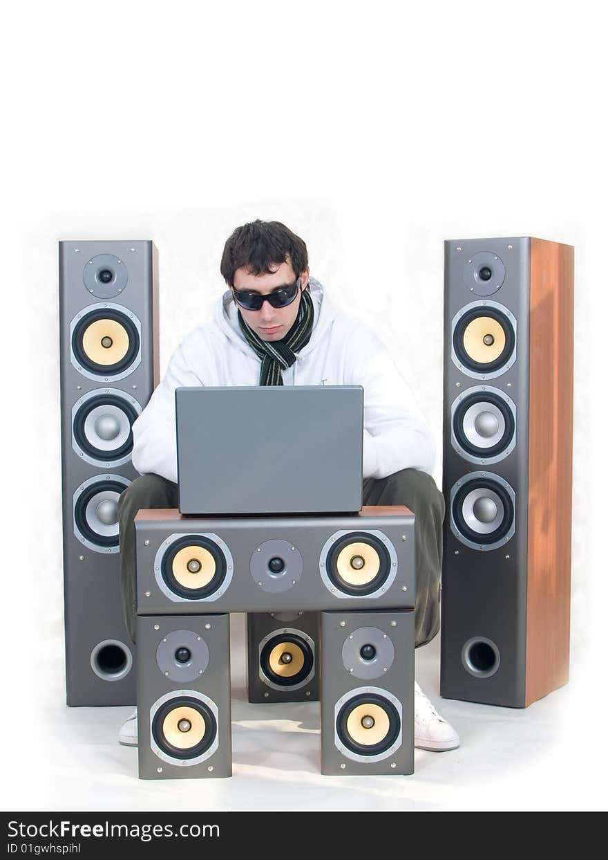 Speakers with yellow bass, laptop and dj. Speakers with yellow bass, laptop and dj