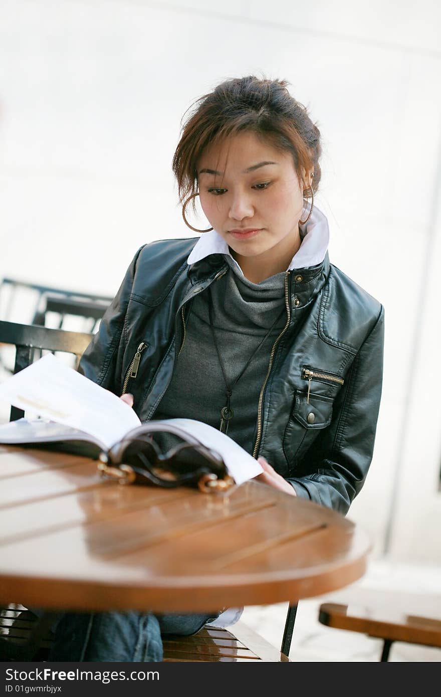 Young asian women reading book