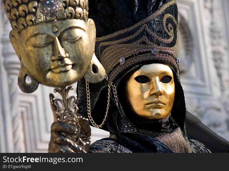 A mask posing in front of the San Zaccaria church in Venice during the 2009 carnival which lasted from February 13 to 24. A mask posing in front of the San Zaccaria church in Venice during the 2009 carnival which lasted from February 13 to 24.