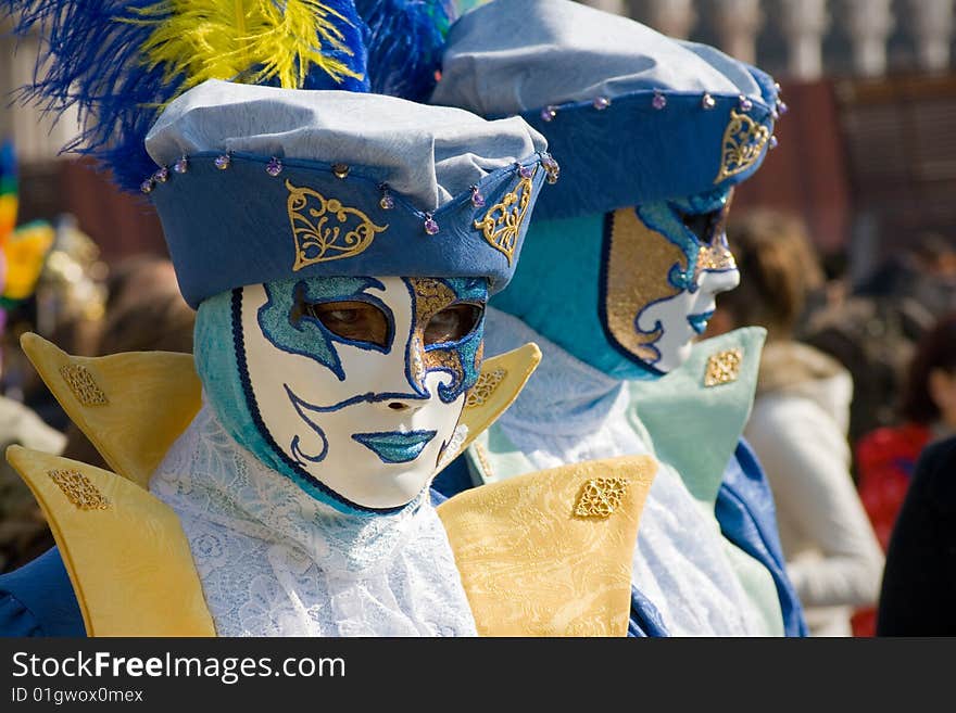 Two male masks posing at St. Mark square during the Venice carnival 2009 which lasted from February 13 to 24. This image was taken on Saturday, 21 February 2009.