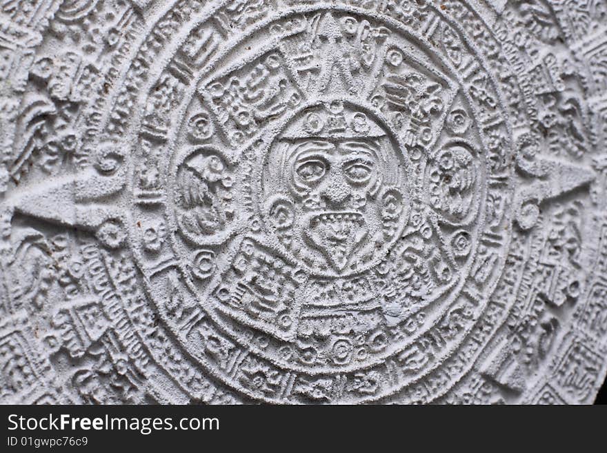 A close-up shot of  an Aztec calendar.