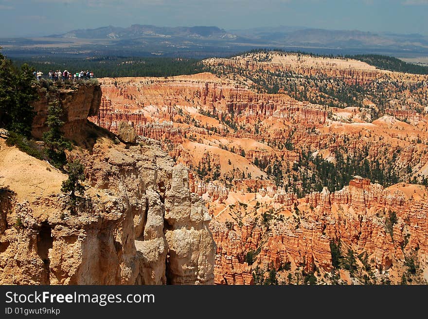 A group of people take in the beauty of Bryce Canyon National Park in Utah. A group of people take in the beauty of Bryce Canyon National Park in Utah.