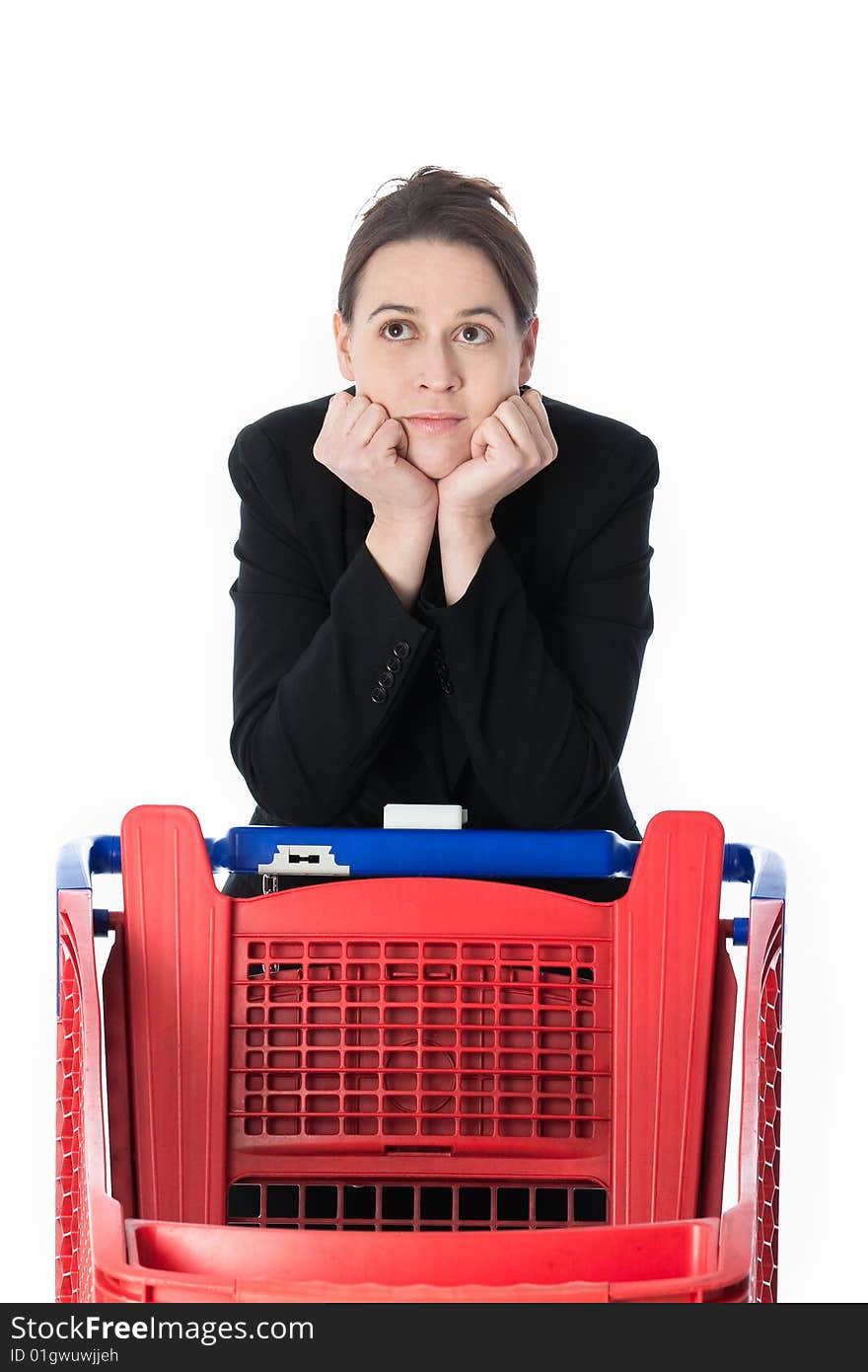 A woman in a business suit in a shopping scenario contemplating what to buy. A woman in a business suit in a shopping scenario contemplating what to buy.