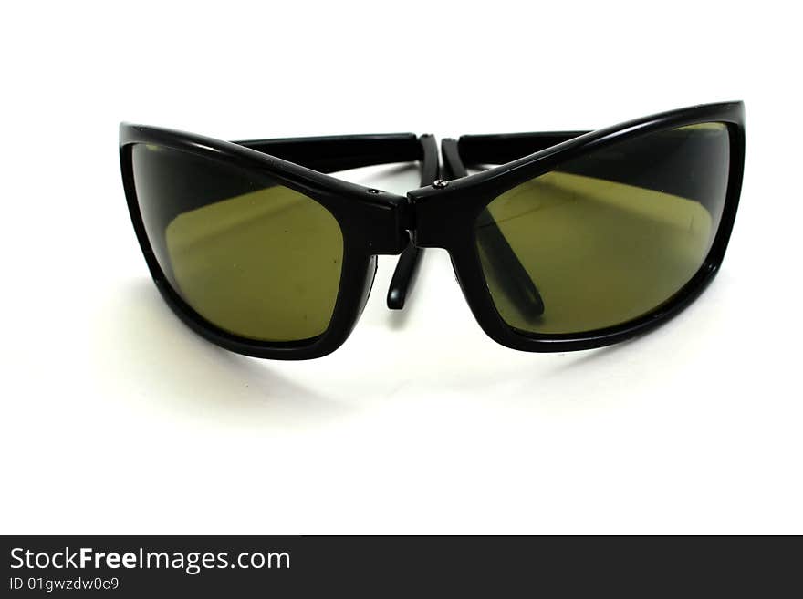 Folding sunglasses isolated on white.