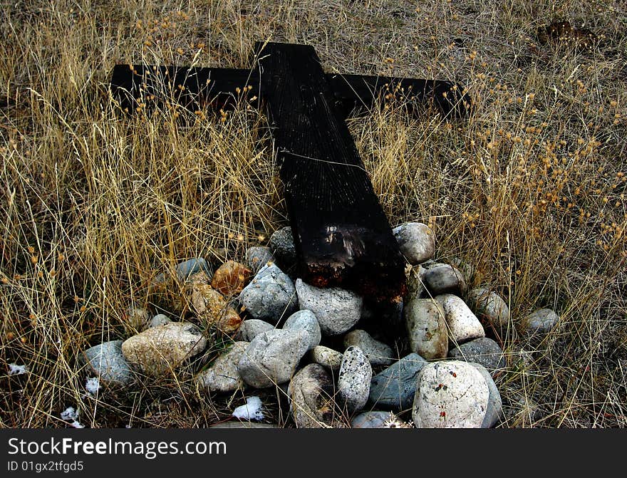 This cross was lying in an old cemetery  way back in the mountains in Montana. This cross was lying in an old cemetery  way back in the mountains in Montana.