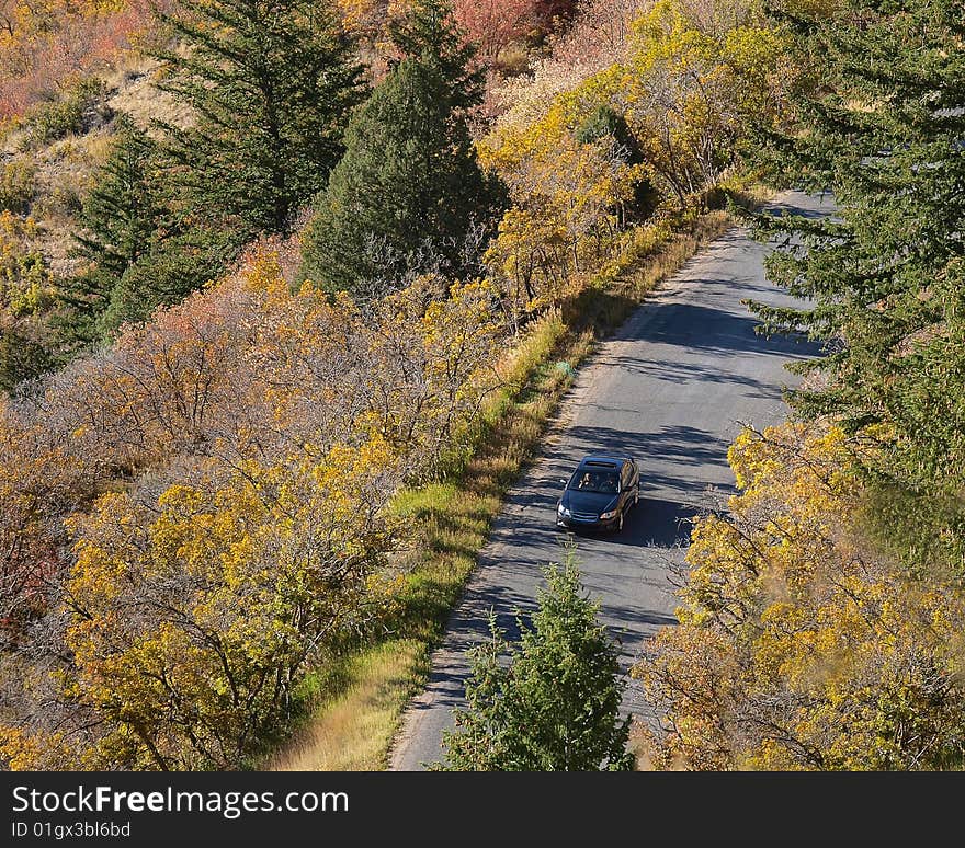 Afternoon autumn drive on a mountain road. Afternoon autumn drive on a mountain road