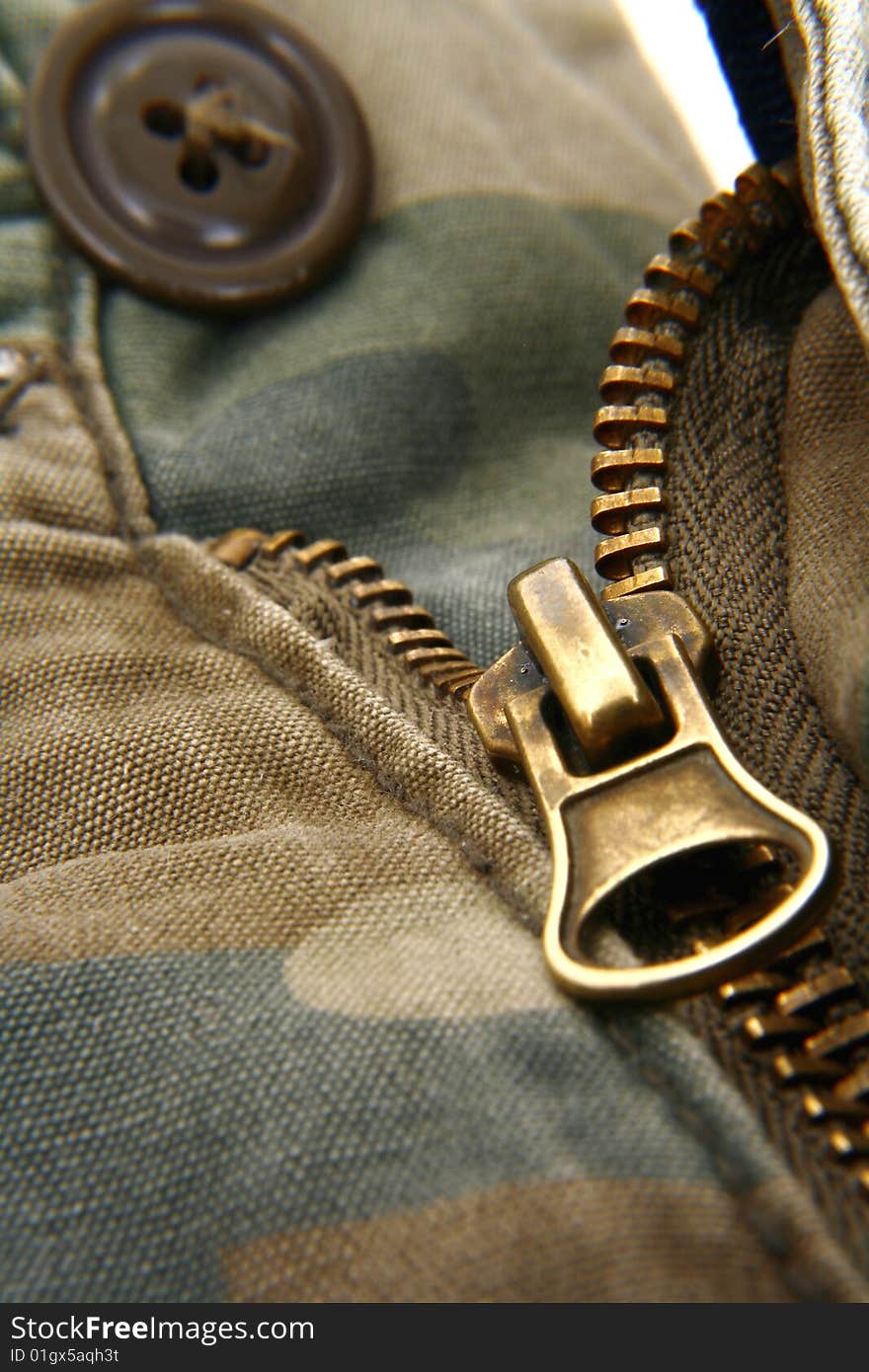 Zipper/fly in a pair of camouflage army pants