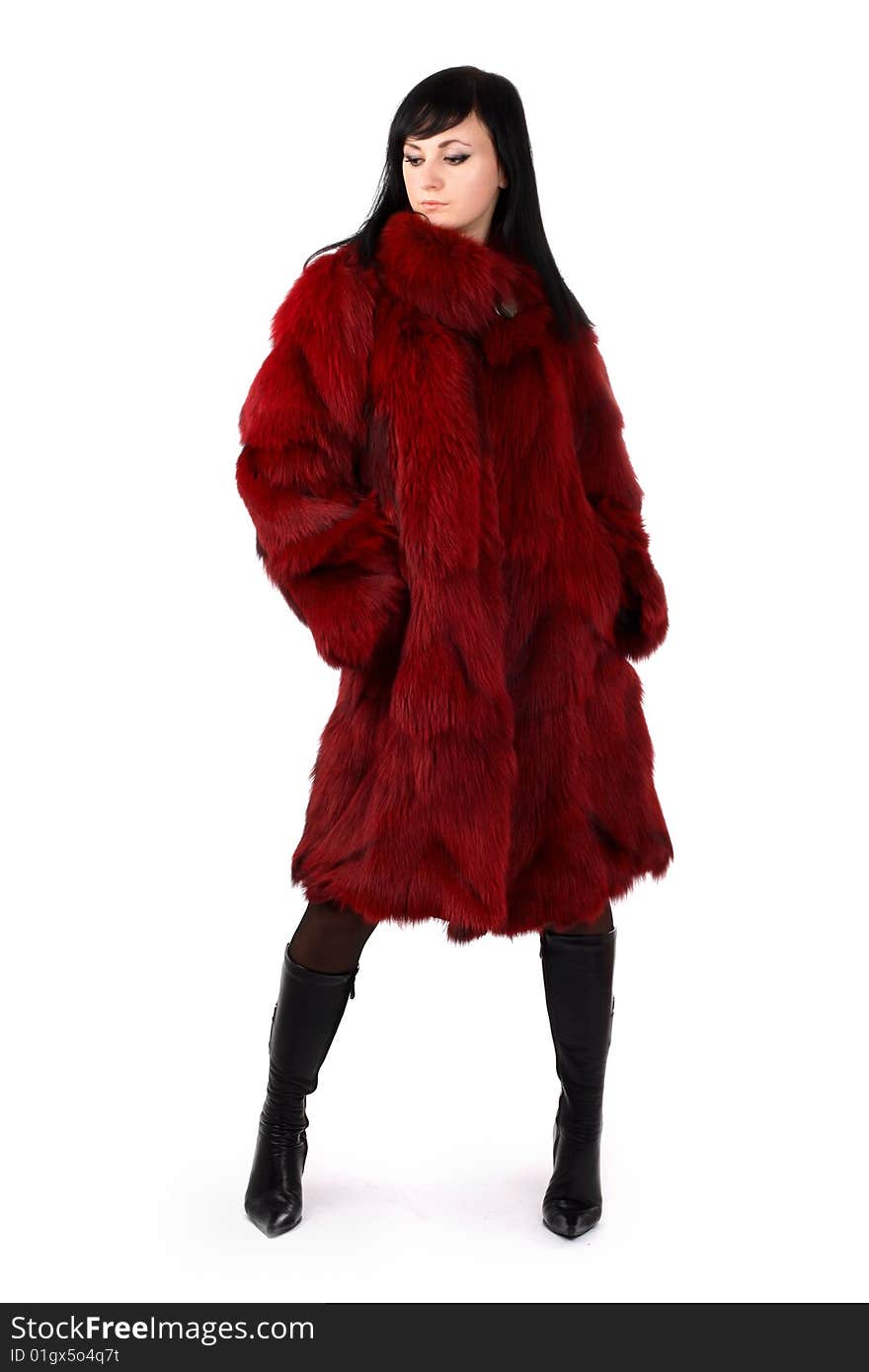 Brunette is in a red fur coat