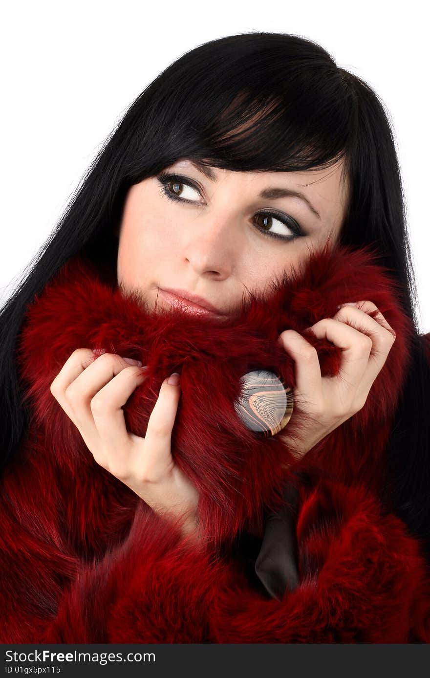 Brunette is in a red fur coat