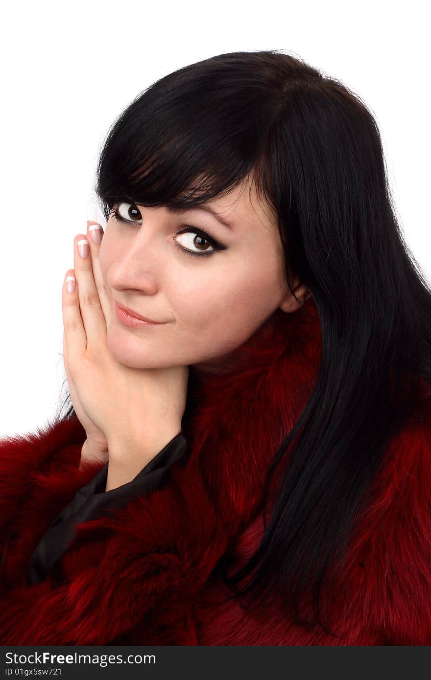 Brunette is in a red fur coat