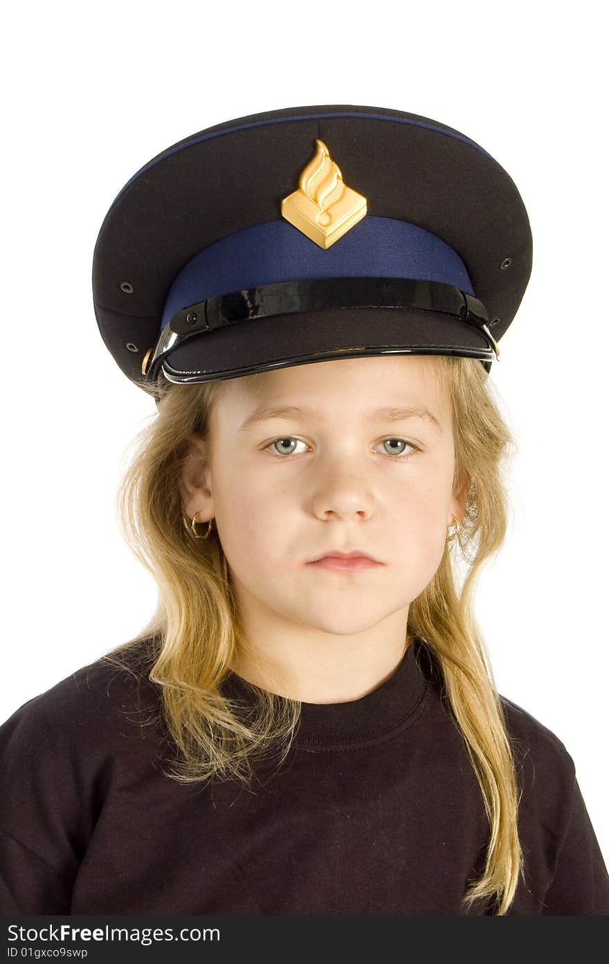 Little girl is wearing a police hat isolated on white