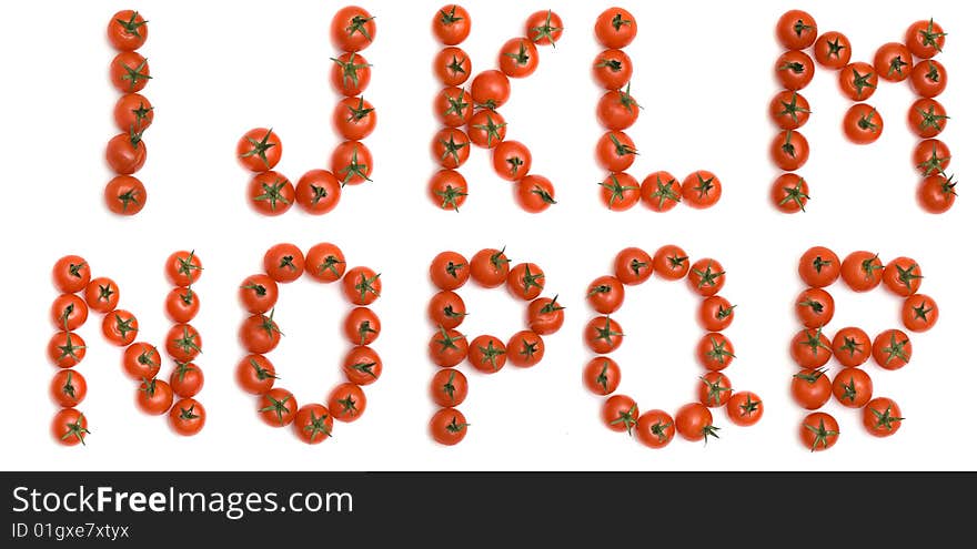 Letters of English alphabet formed from tomatoes