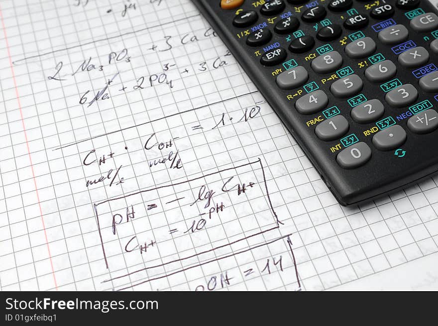 Engineering calculation and calculator on a table