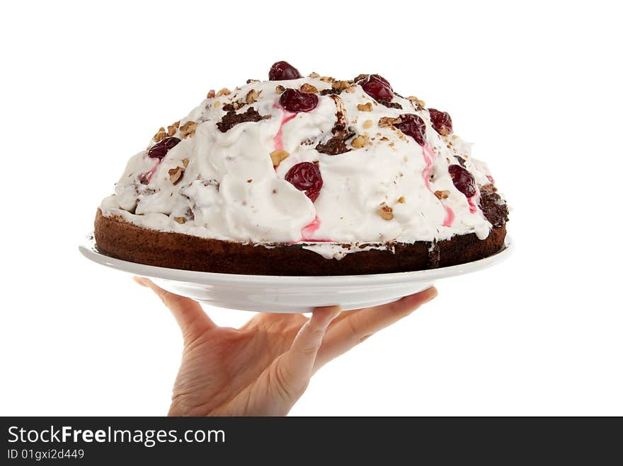 Homemade cake in the hands isolated over white