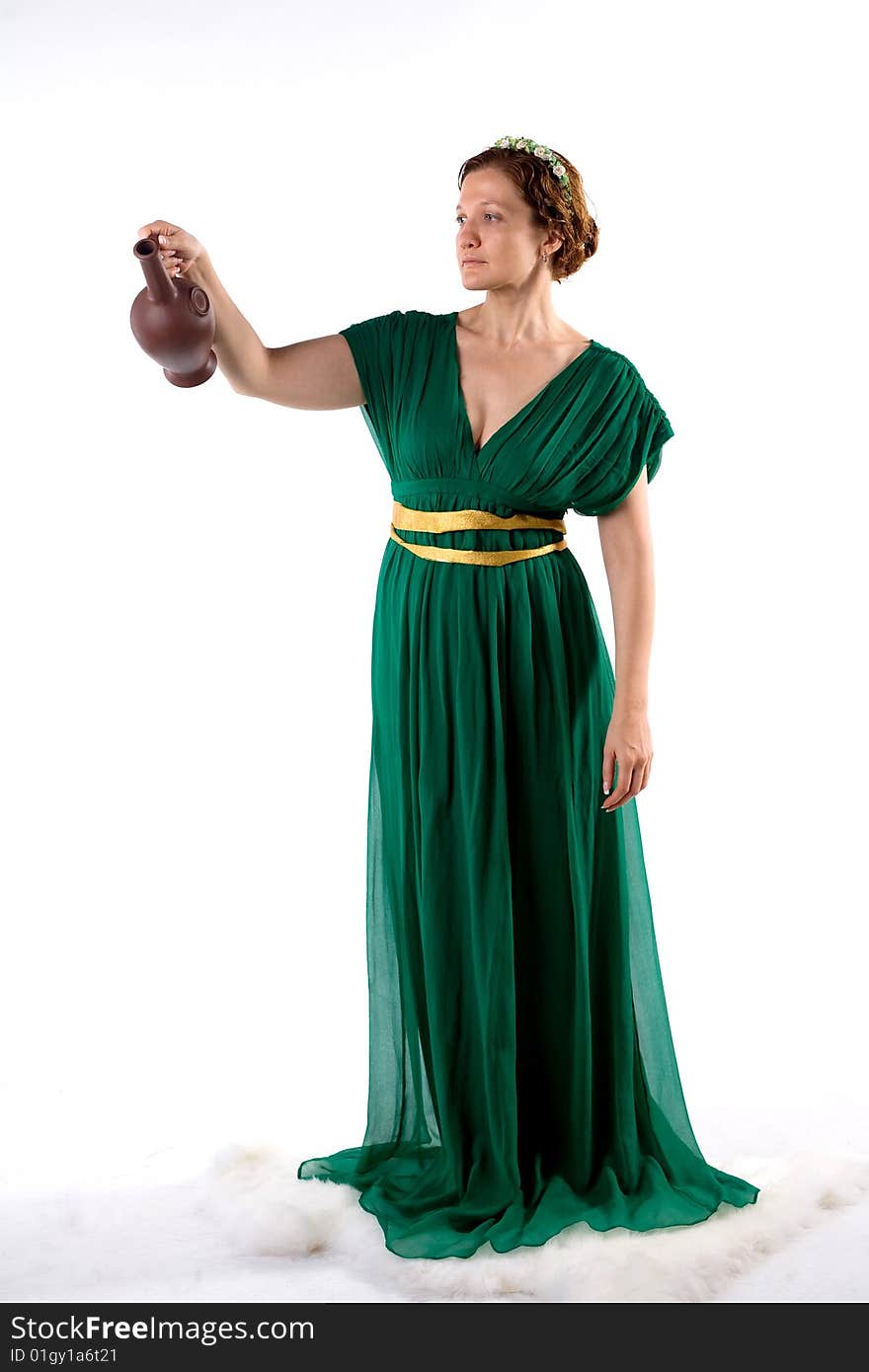 Lady in green antique dress handing jug on white background. Lady in green antique dress handing jug on white background