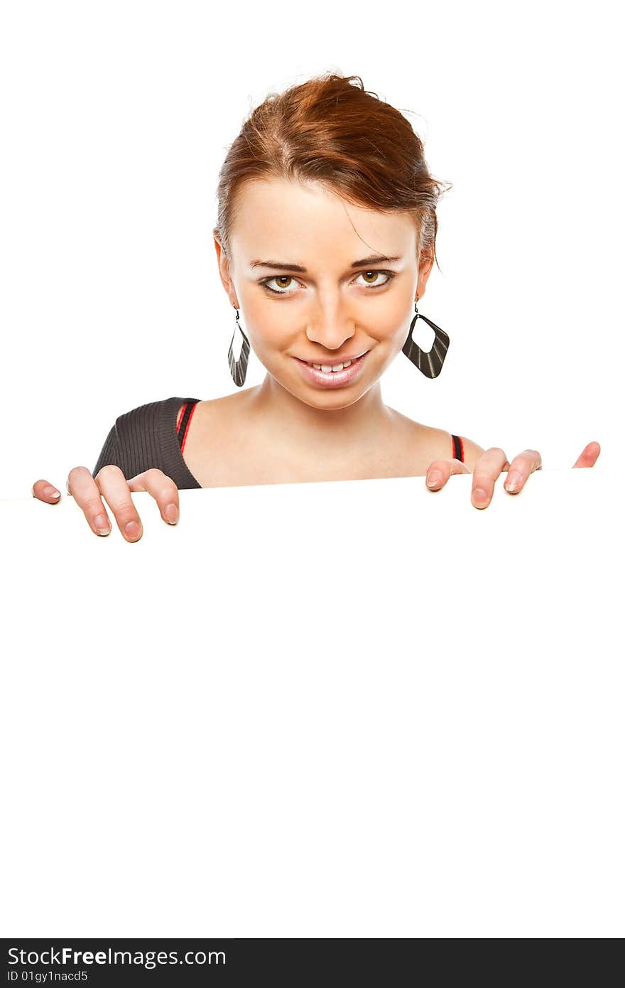 Portrait of a beautiful woman holding a blank billboard