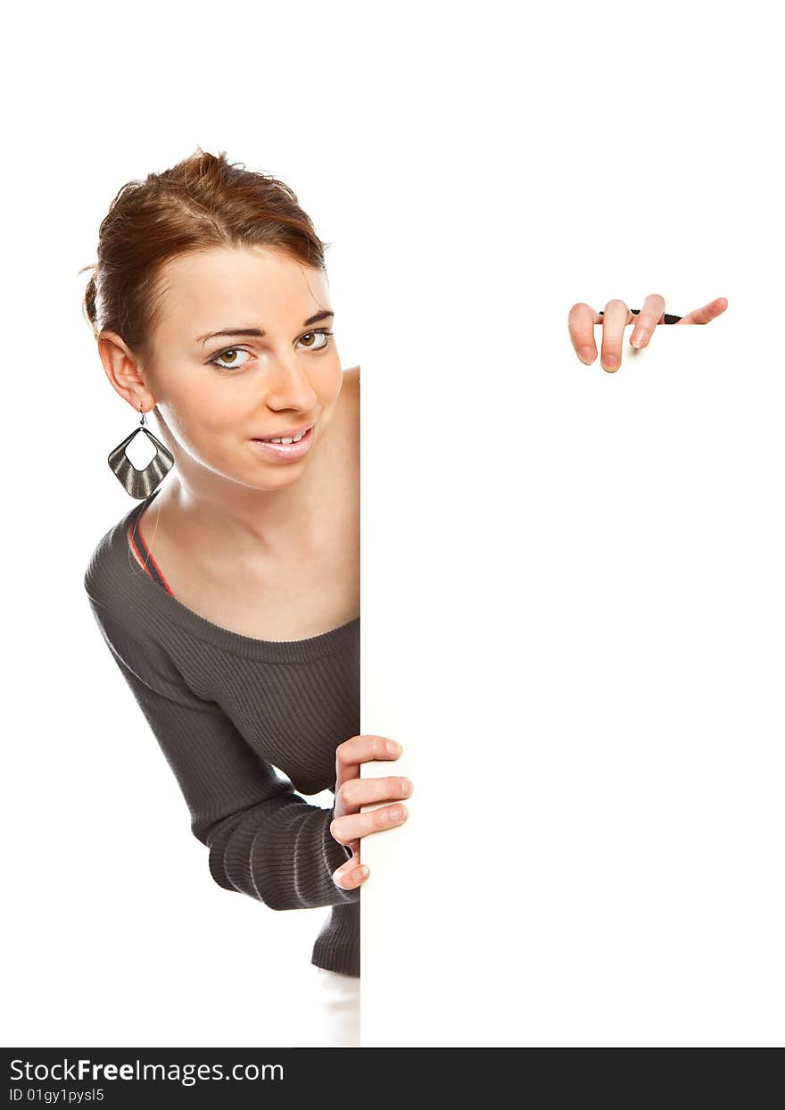 Portrait of a beautiful woman holding a blank billboard