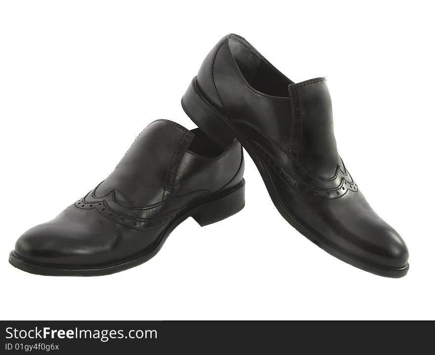 Black male leather shoes isolated in white. Black male leather shoes isolated in white