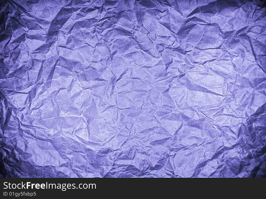 Old crumpled paper with dark edges. Old crumpled paper with dark edges