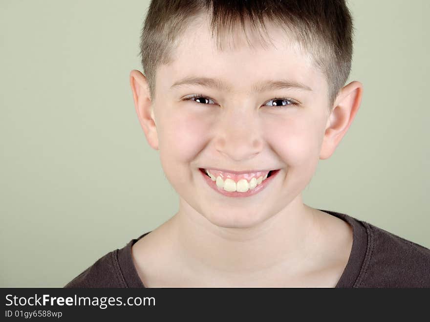 Portrait of smiling boy with big teeth