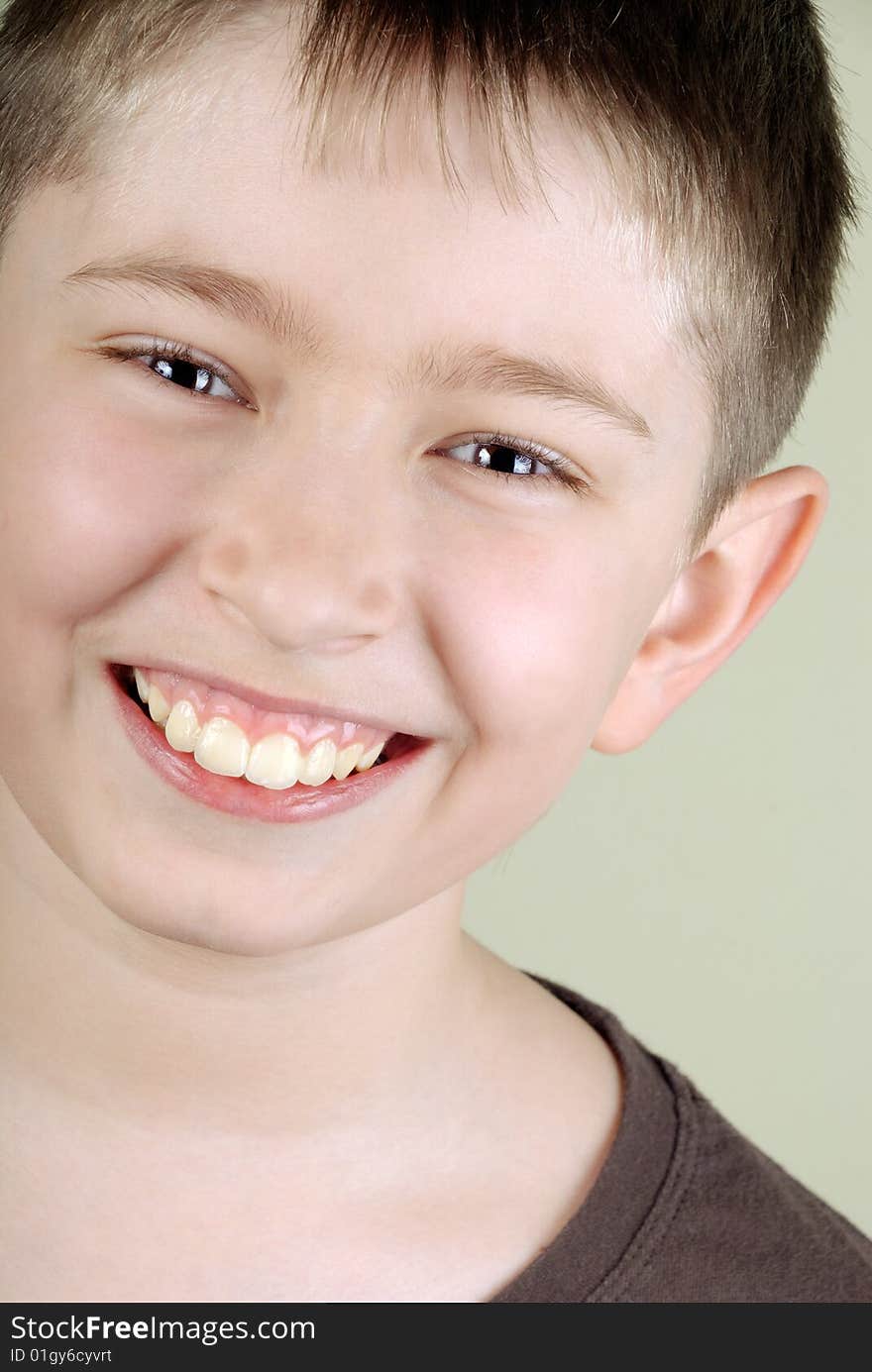 Portrait of smiling boy with big teeth