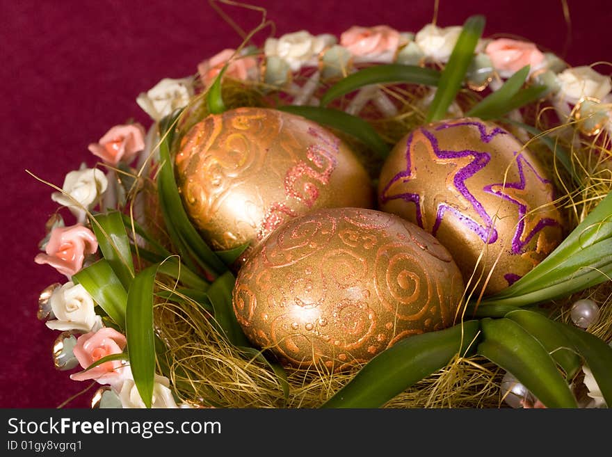 Golden eggs faforovom on a platter. Golden eggs faforovom on a platter