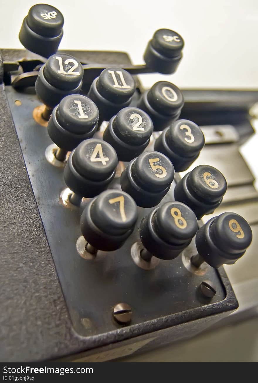 Old bakelite keypad from a mechanical adding machine with 12 keys. Old bakelite keypad from a mechanical adding machine with 12 keys